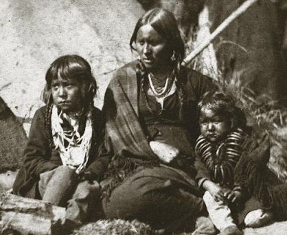 Little Crow's wife and children at Fort Snelling Wife of chief Little Crow was held at prison camp with her children