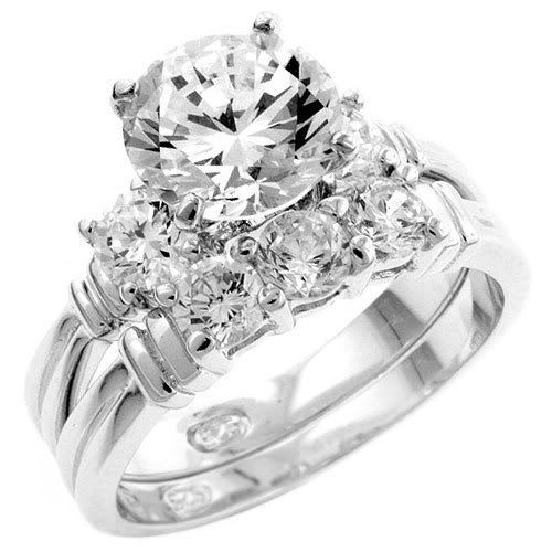 Forum Image: http://i126.photobucket.com/albums/p82/HELAINNA/wedding-ring.jpg